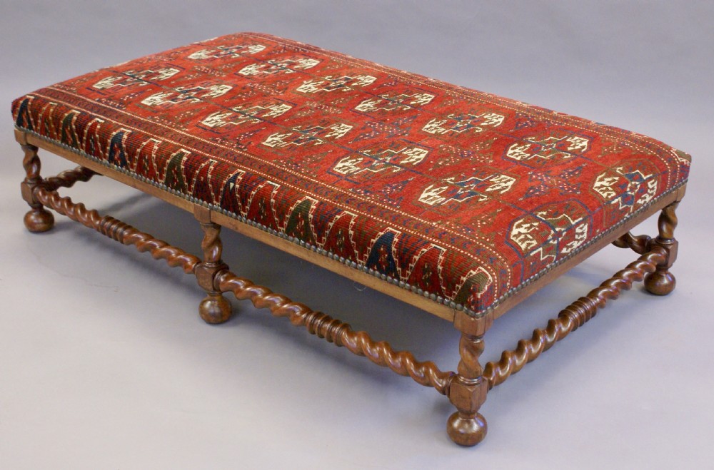 A very large walnut stool View IV