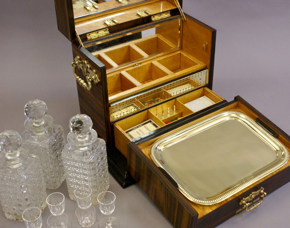 A superb Cormandel decanter & games compendium View VI