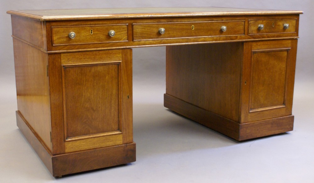 A George III mahogany partners desk View III