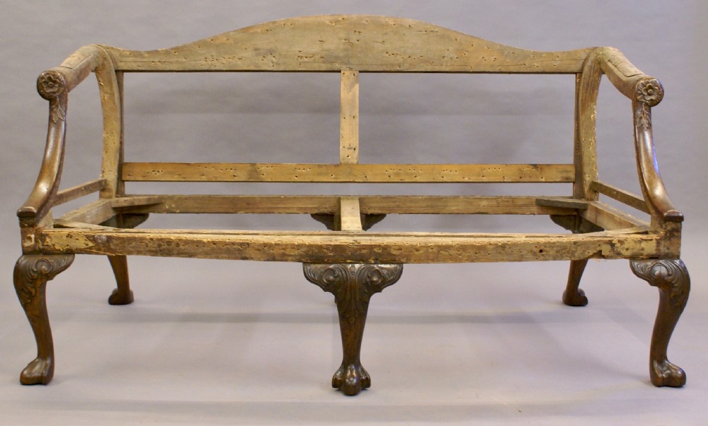A rare George II walnut Gainsborough sofa View III
