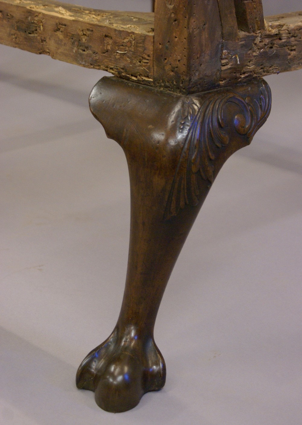A rare George II walnut Gainsborough sofa View VII