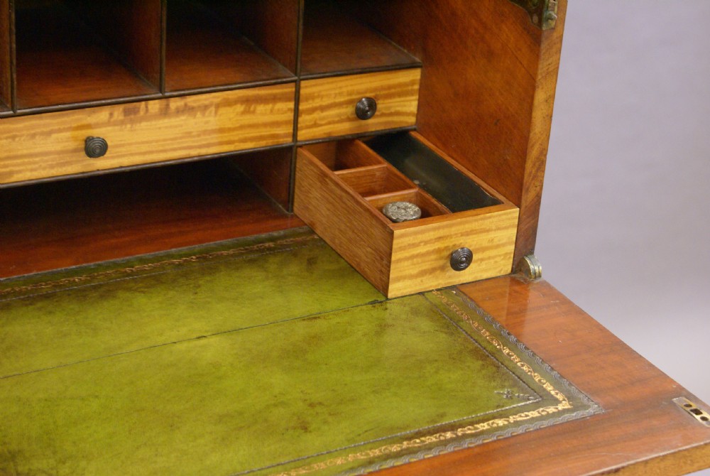 A flame mahogany, secretaire Wellington chest View VII
