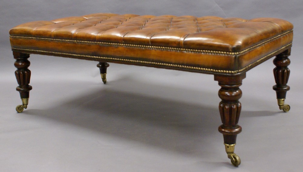 A very large leather upholstered stool View III