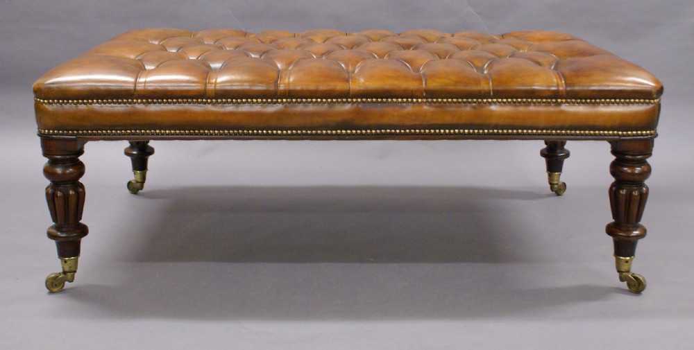 A very large leather upholstered stool View IV