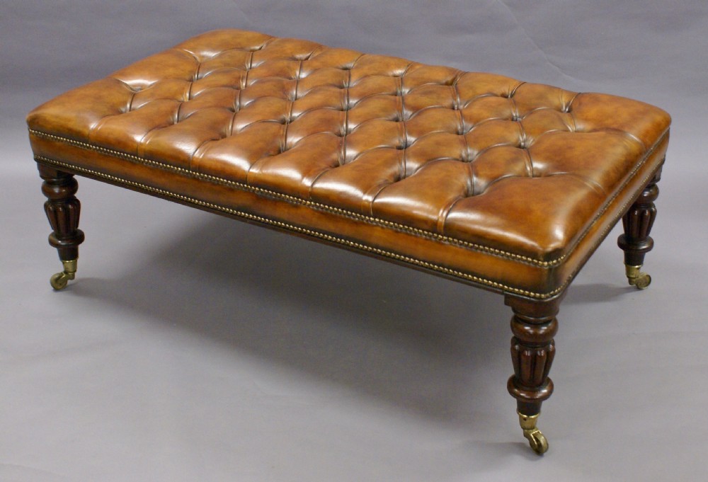 A very large leather upholstered stool View V