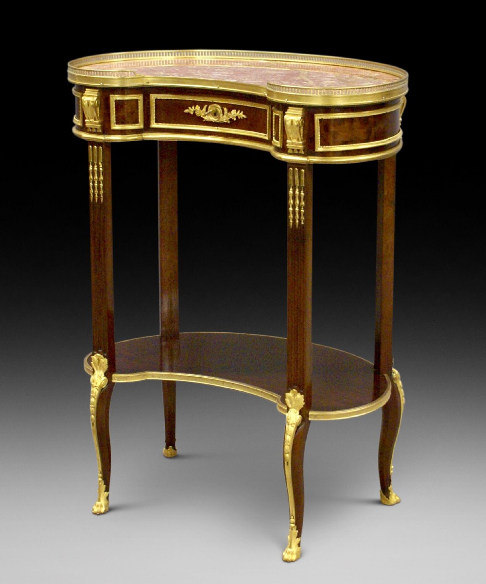 A fine French mahogany and ormolu mounted table