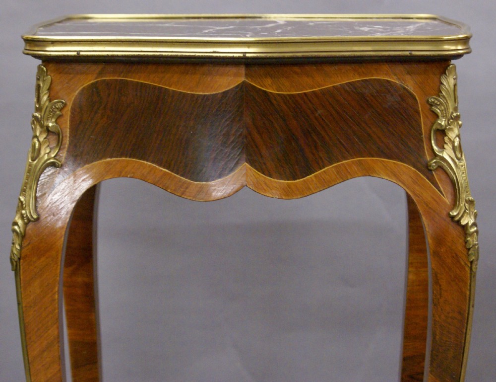 A superb pair of French side tables View III