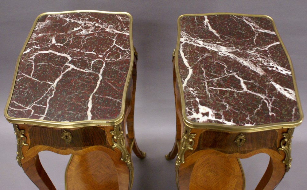 A superb pair of French side tables View VI