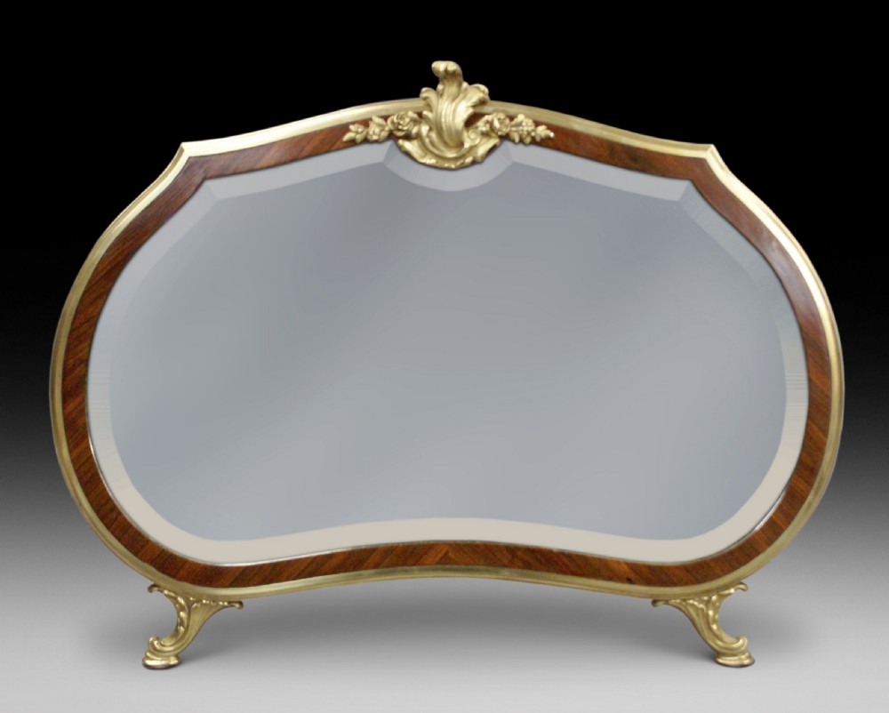 A king wood and ormolu dressing mirror