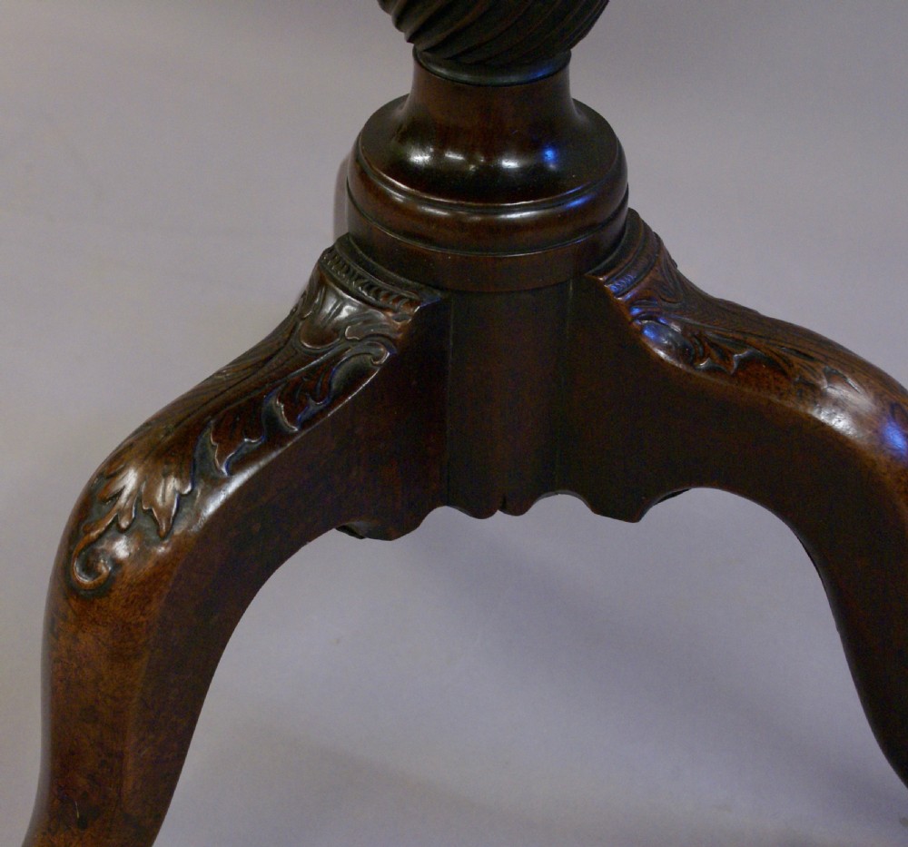 An 18th century carved tripod table View V