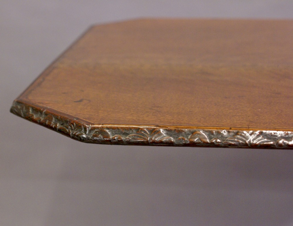 An 18th century carved tripod table View VI
