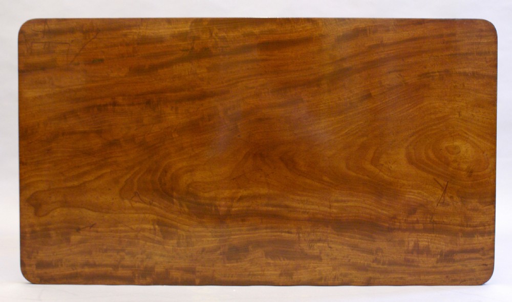 Regency mahogany stretcher table View II