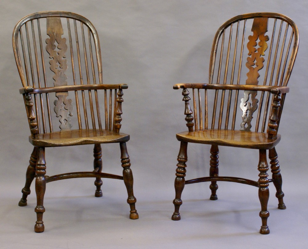 A matched pair of yew wood arm chairs View II