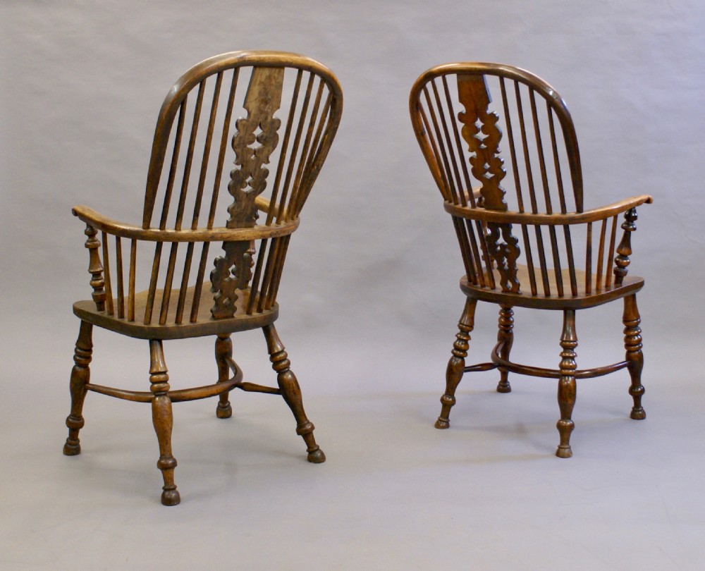 A matched pair of yew wood arm chairs View VII