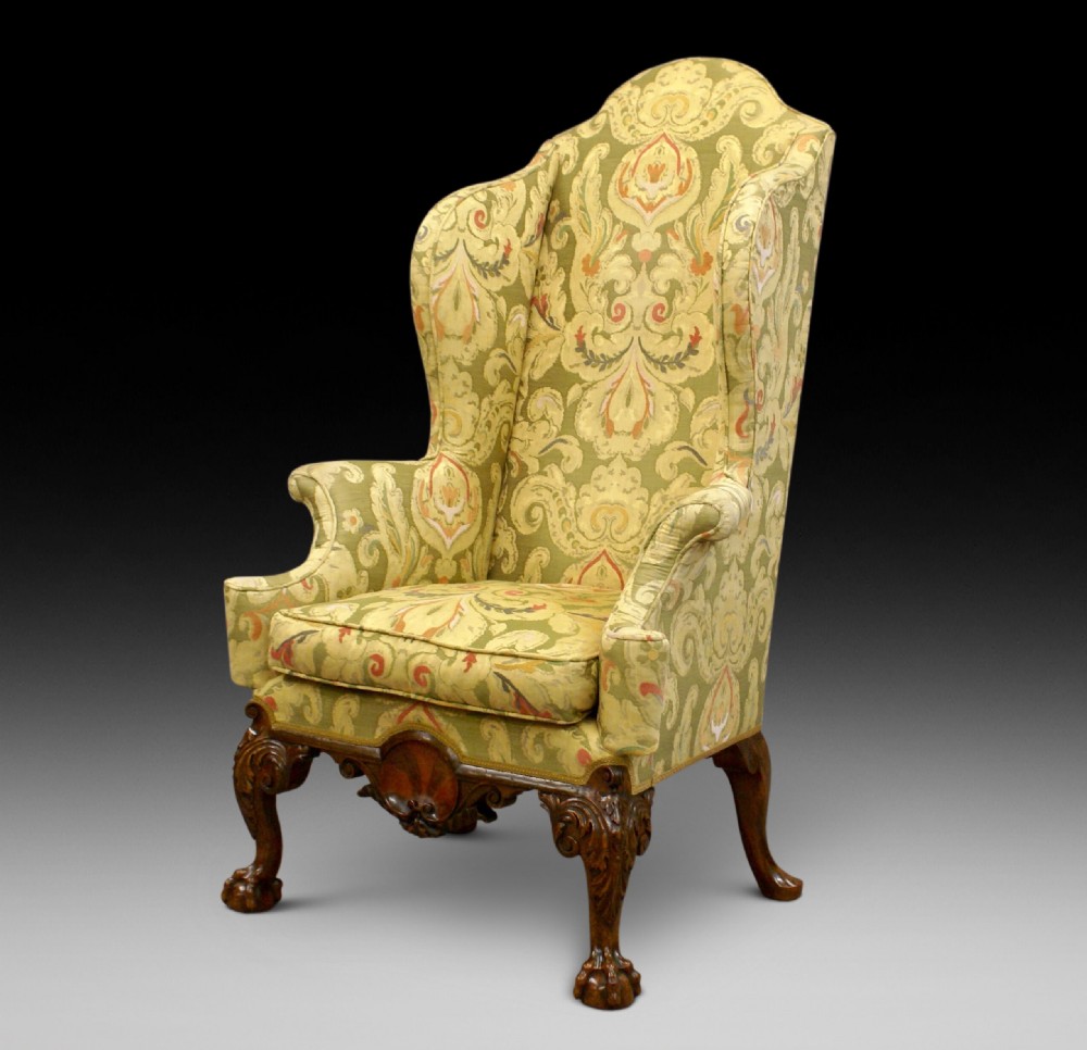 A George I style walnut wing chair