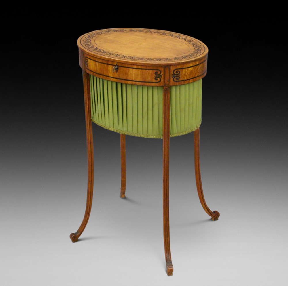 A fine Regency satinwood work table
