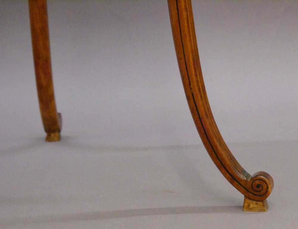 A fine Regency satinwood work table View V