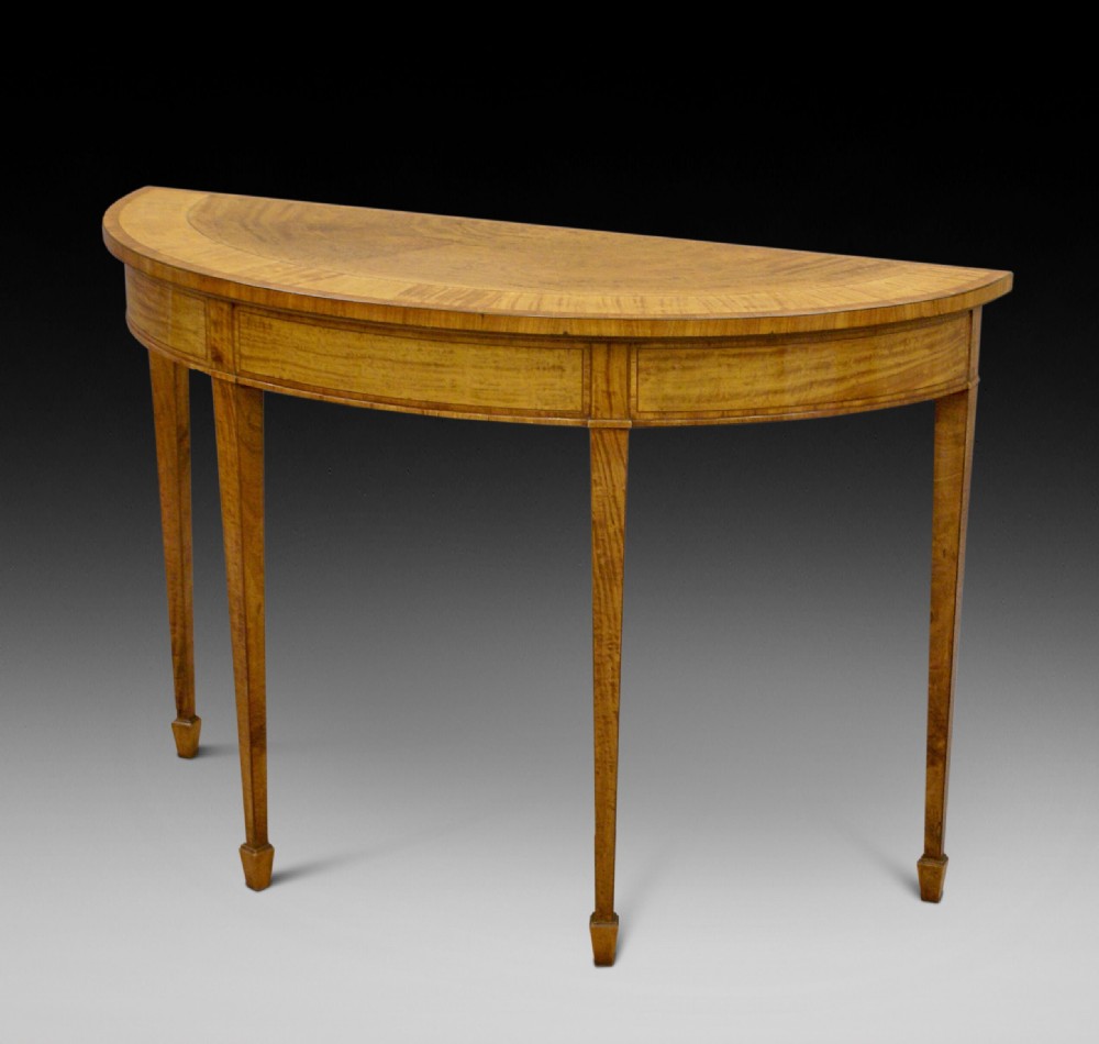 A satinwood demi lune console table