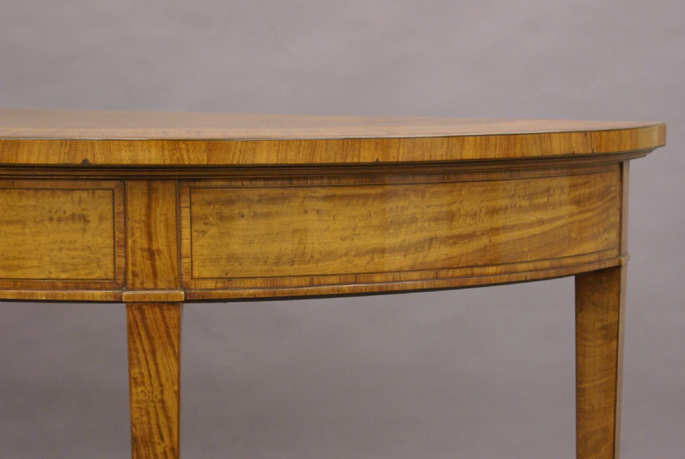 A satinwood demi lune console table View V