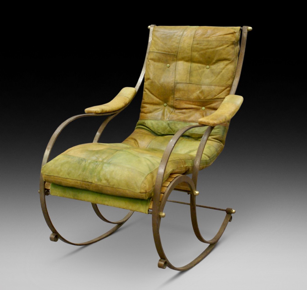 A steel and leather rocking chair by R.W.Winfield.