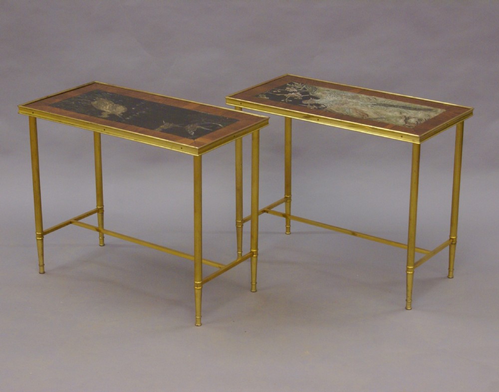 A pair of decorative brass tables  View III