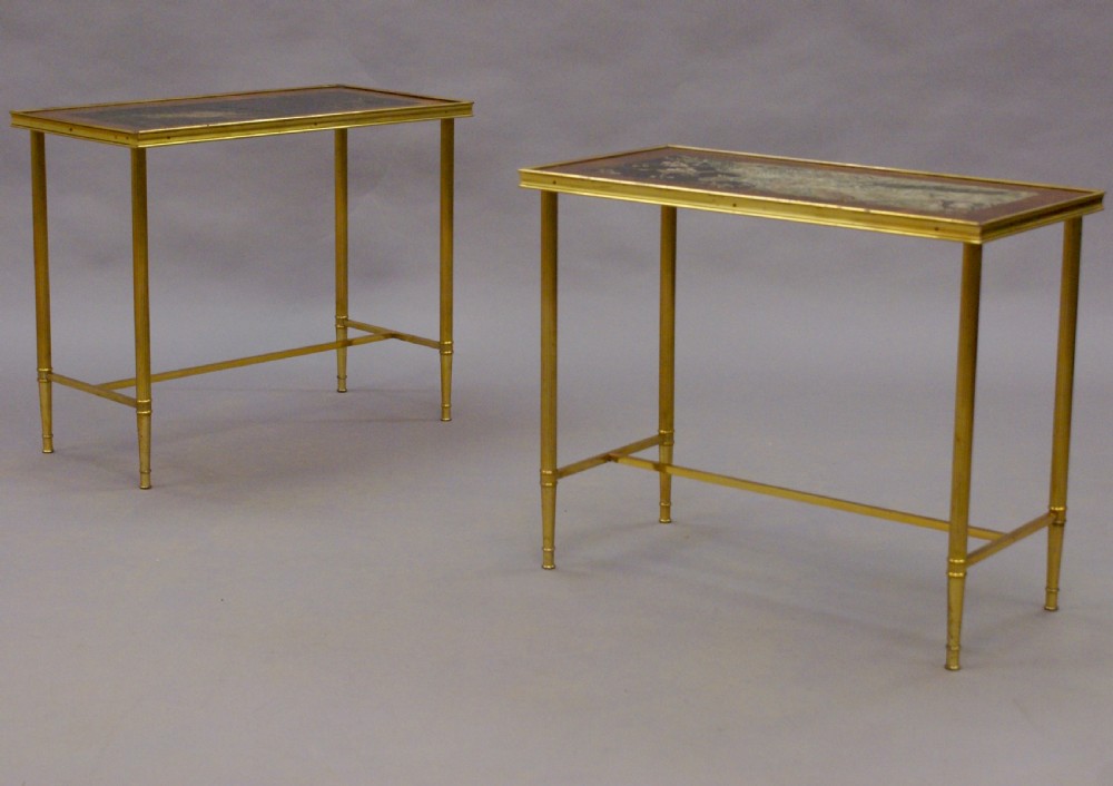 A pair of decorative brass tables  View VI