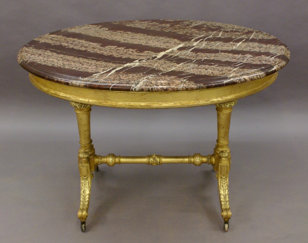 An attractive & unusual marble & gilt centre table View II