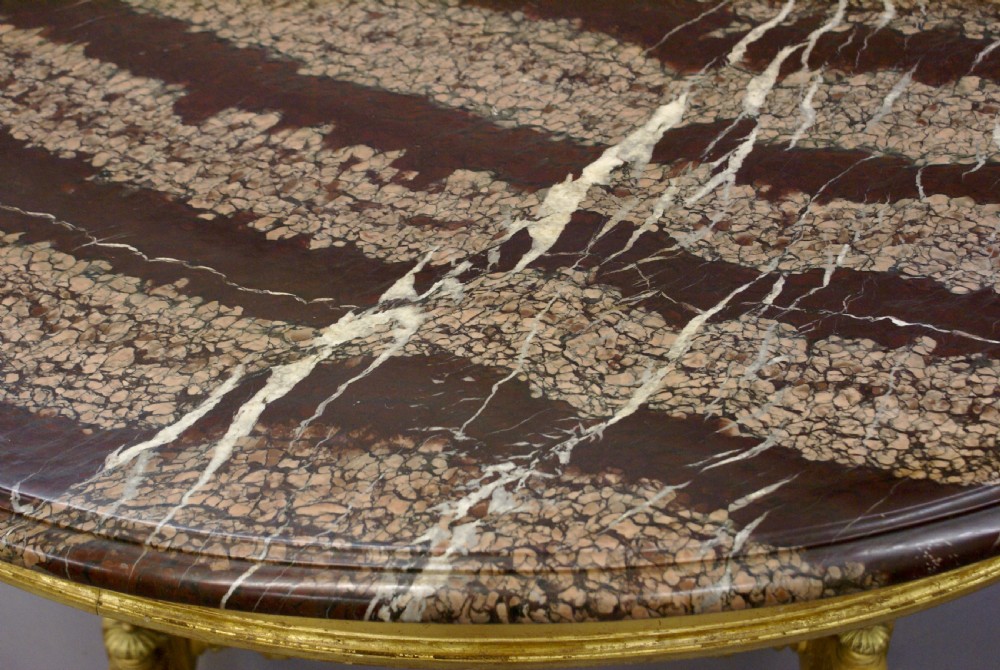 An attractive & unusual marble & gilt centre table View VI