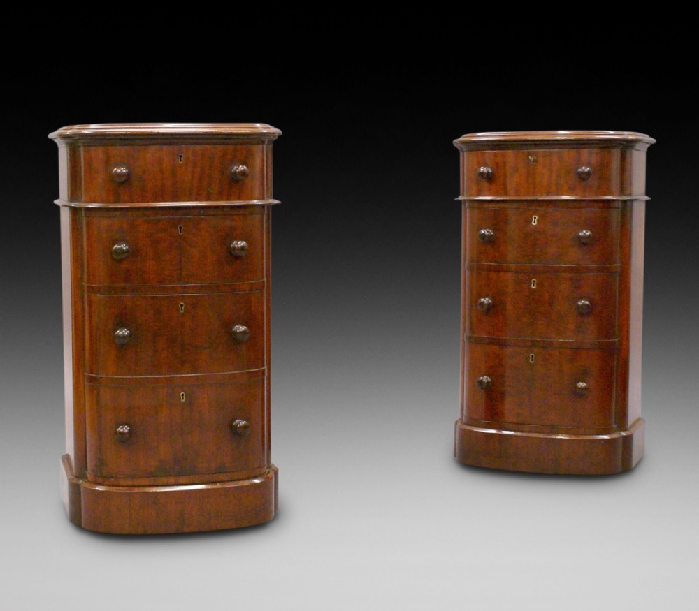 A pair of 19th C bedside chests