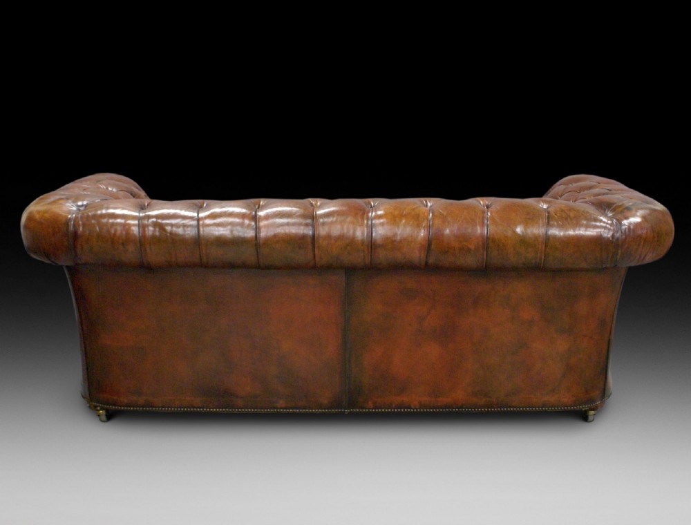 An early 20th C leather chesterfield View IV