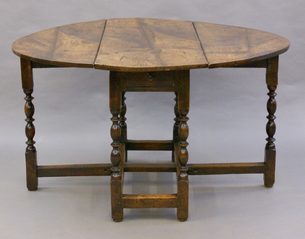 Late 17th C oak gateleg table with fine patia View VI