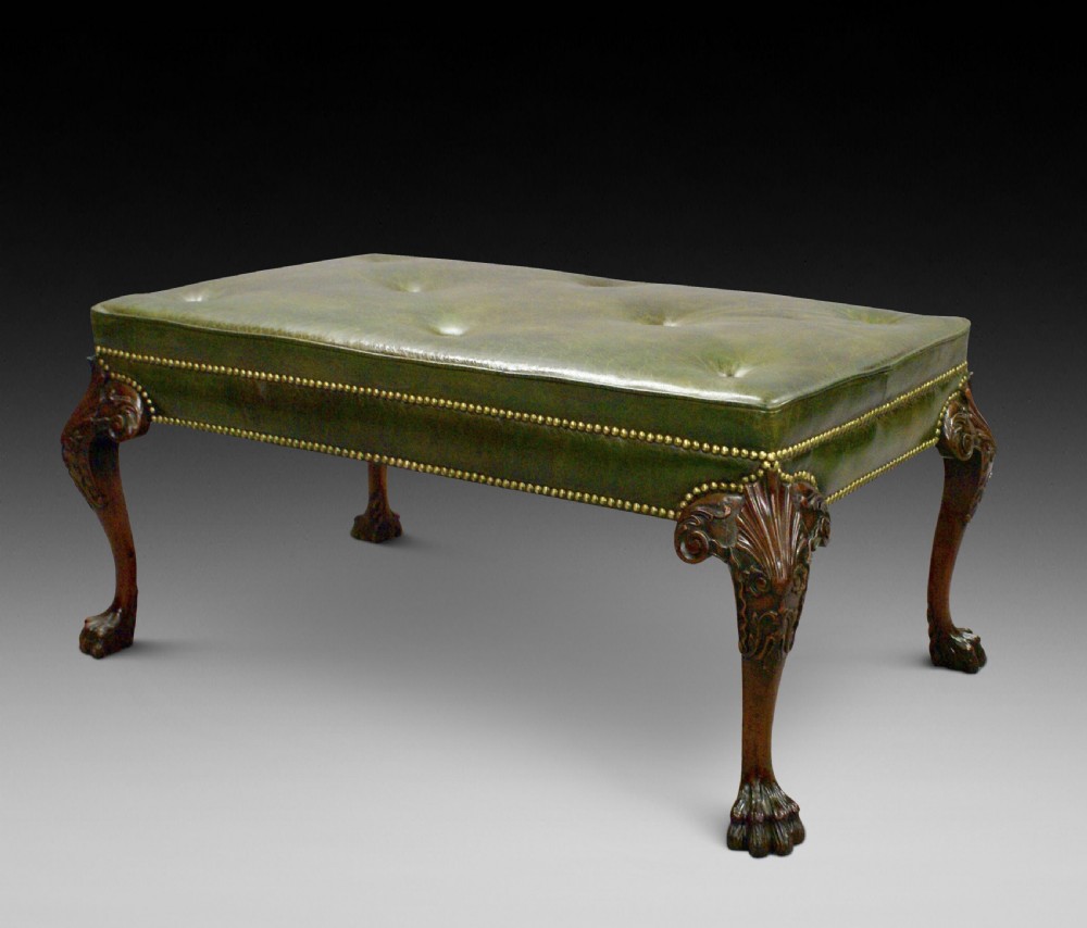 A fine George I style carved stool. View II