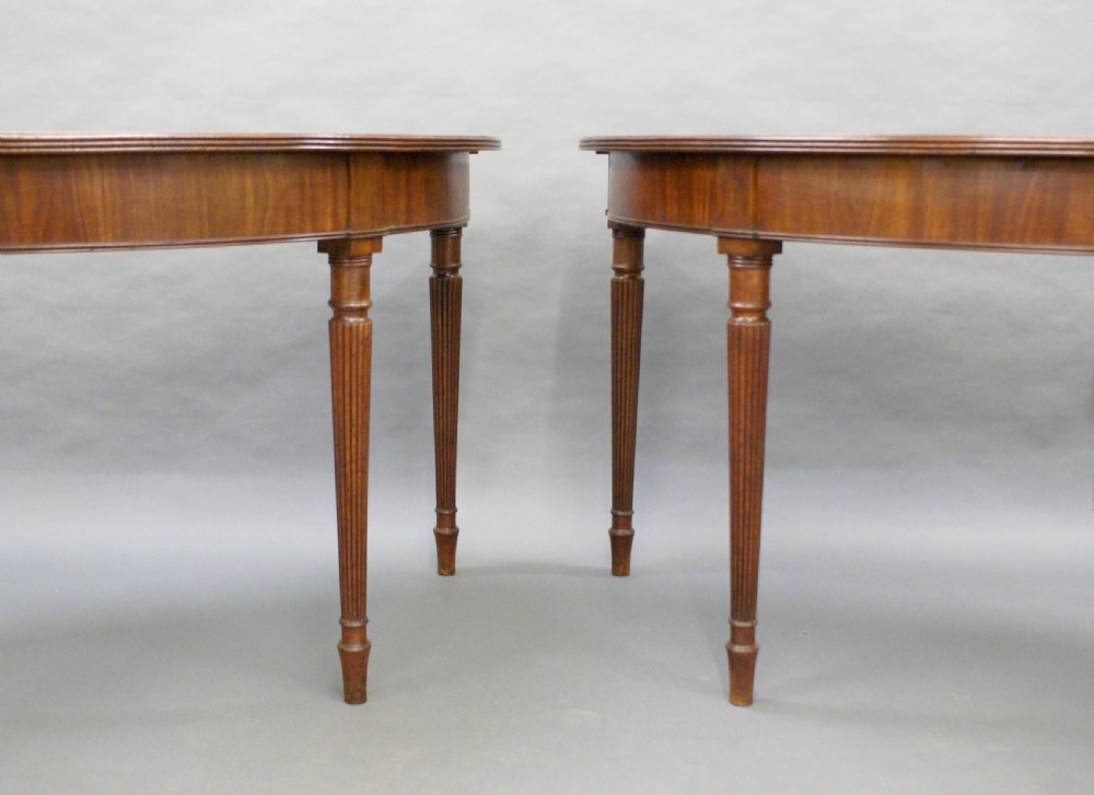 A pair of George III mahogany console tables View III