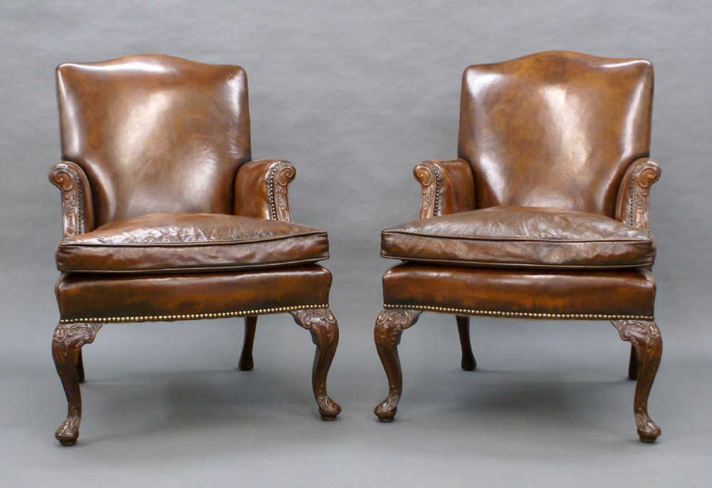 A pair of Georgian style Gainsborough chairs View II