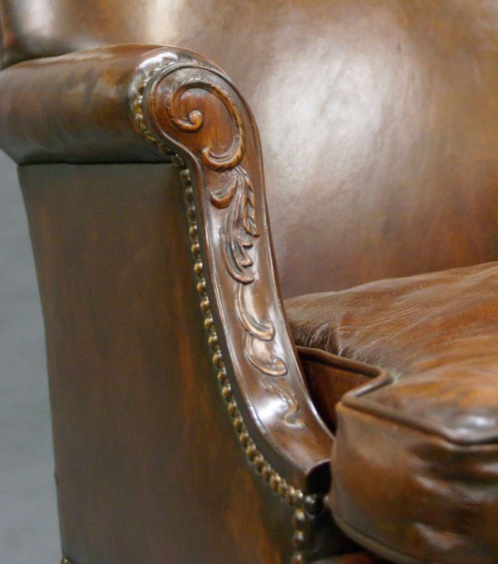 A pair of Georgian style Gainsborough chairs View IV