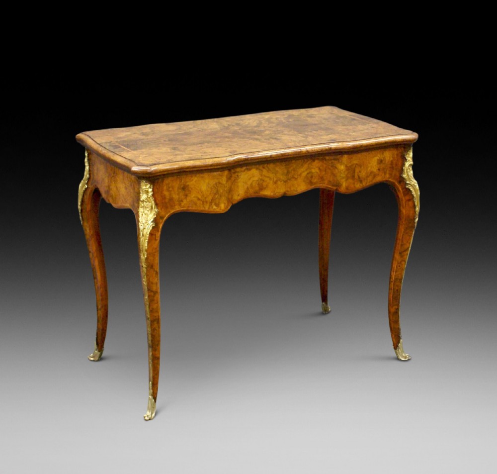 A burl walnut, inlaid and ormolu mounted card table