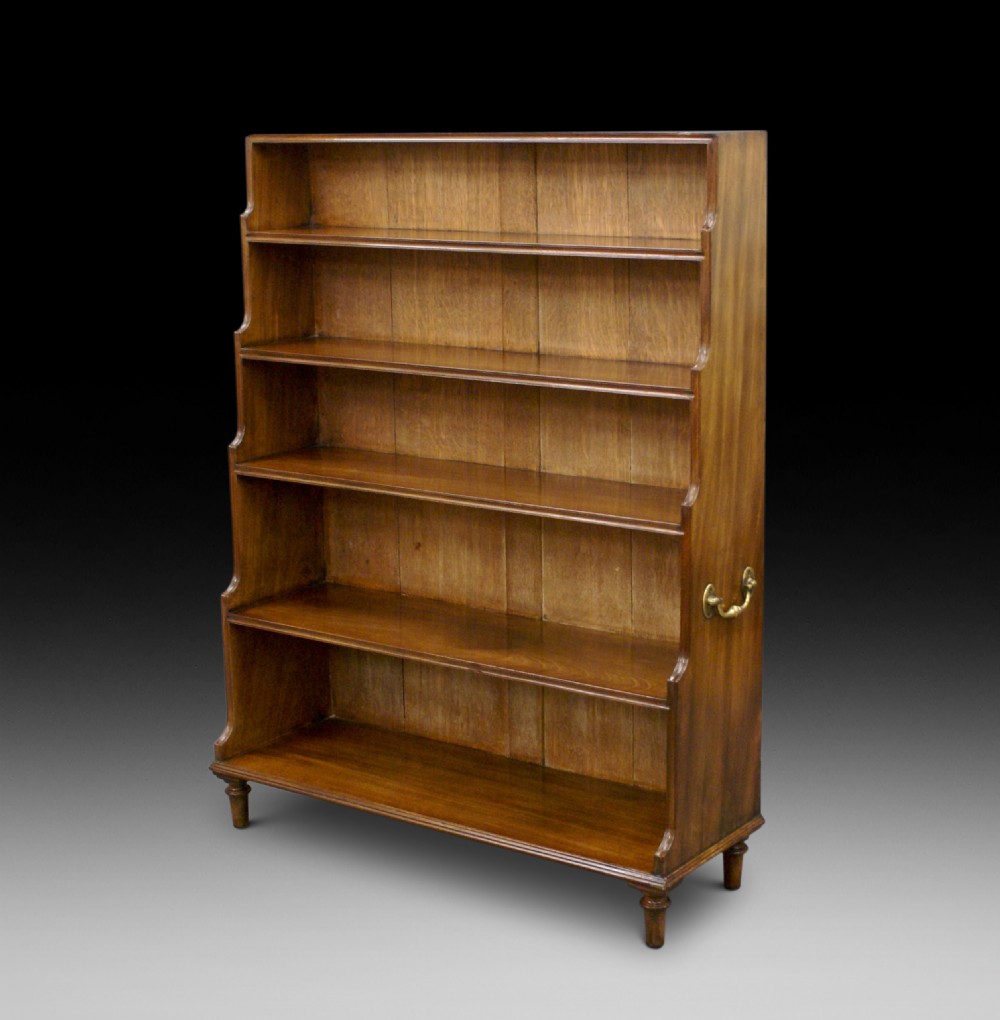A late Georgian mahogany waterfall bookcase