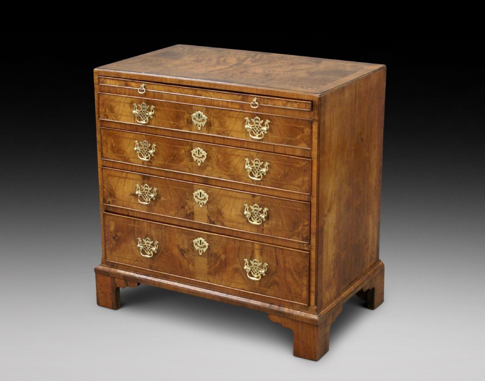 George II figured walnut chest of drawers
