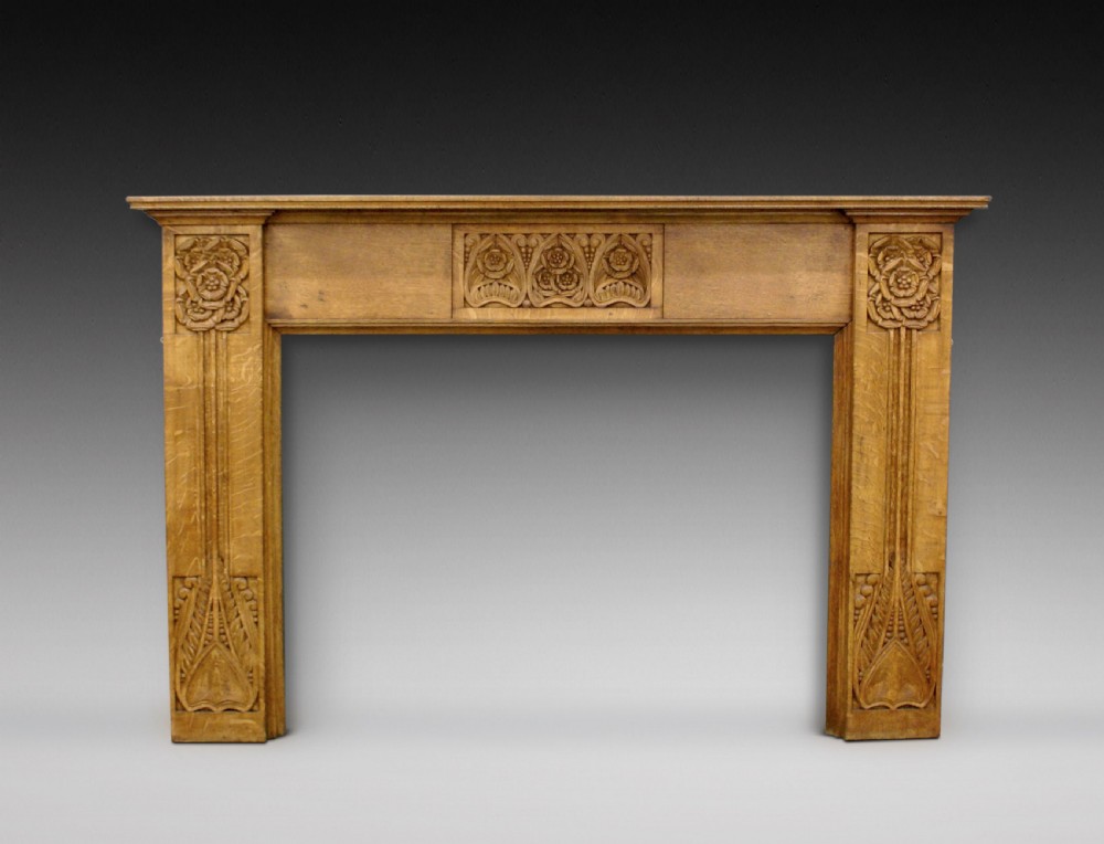 An oak Art Nouveau fire surround