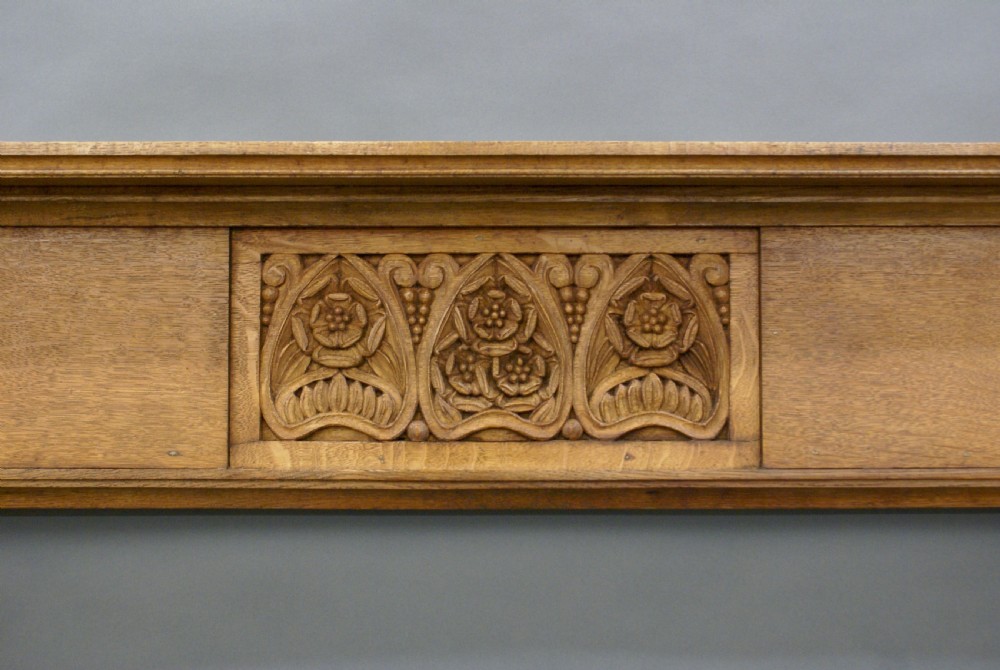 An oak Art Nouveau fire surround View II