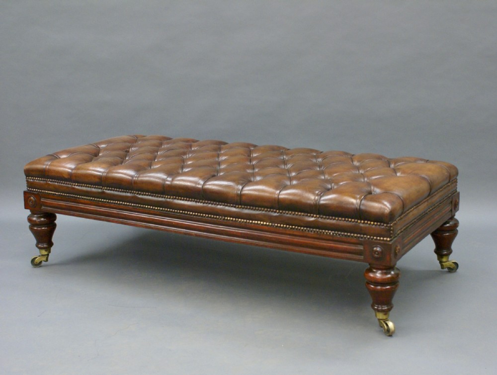 A very large Victorian leather upholstered stool View II