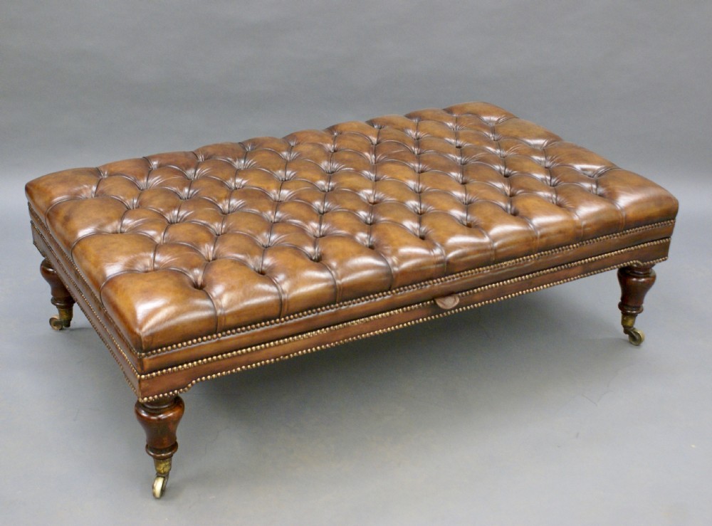 A very large leather upholstered stool View III