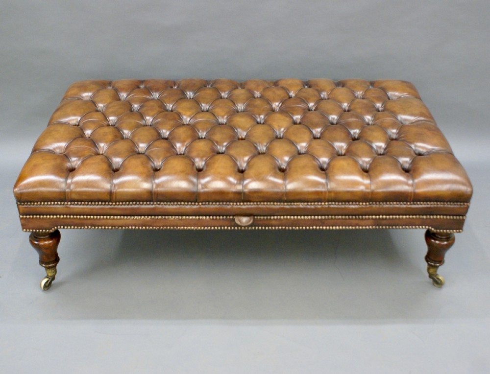 A very large leather upholstered stool View IV