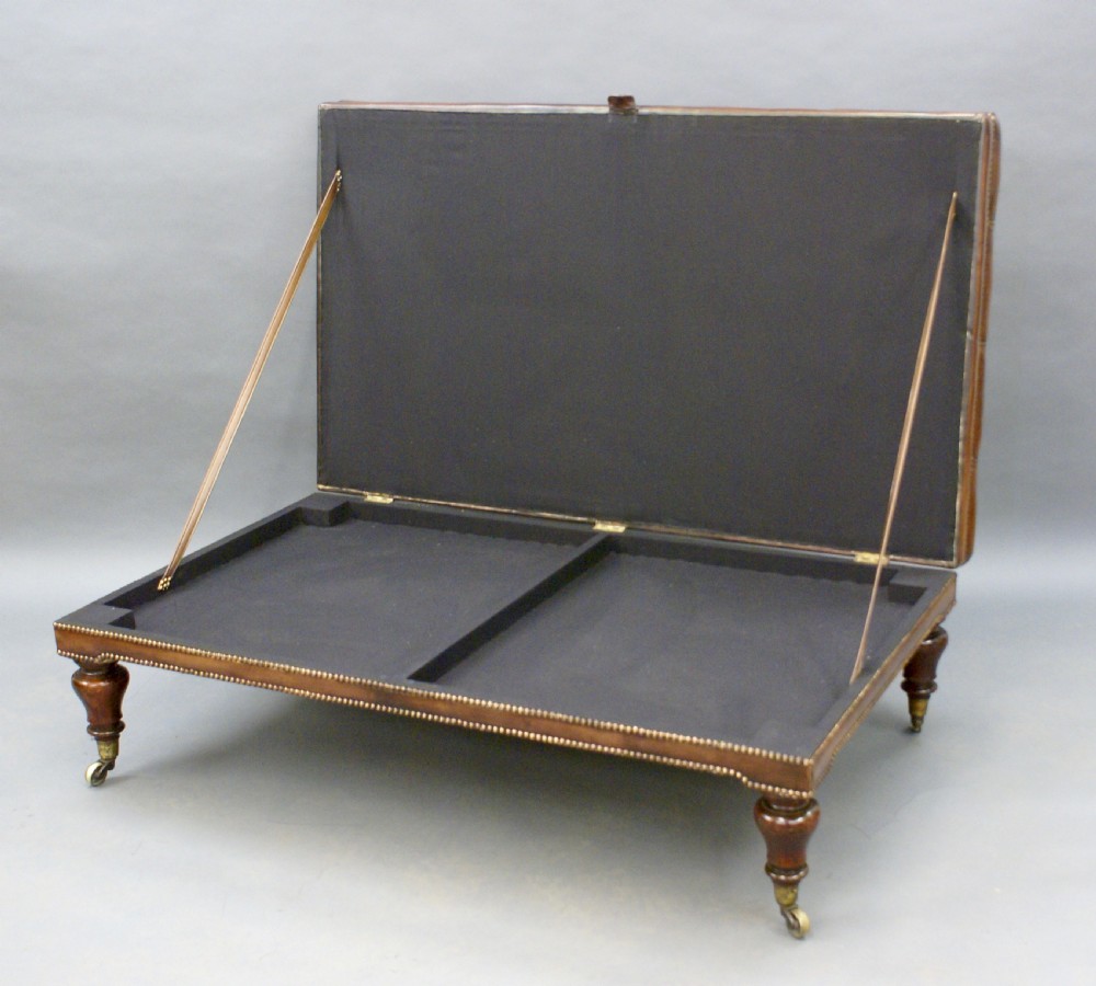 A very large leather upholstered stool View VI