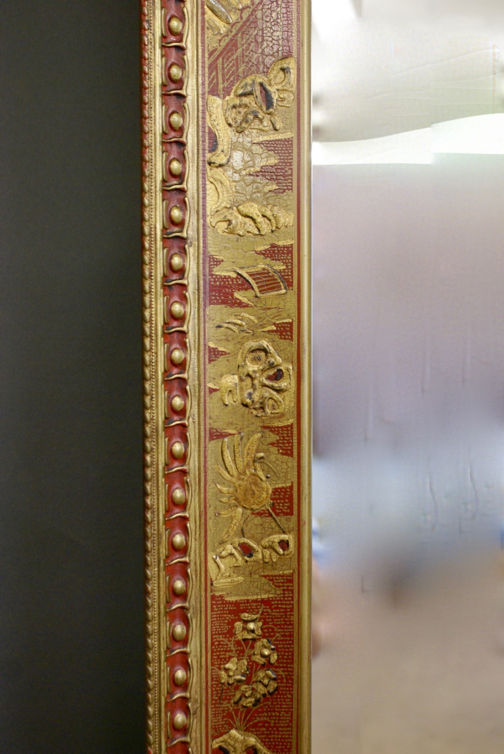 A pair of Chinoiserie, red japanned mirrors View IV