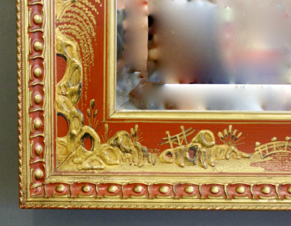 A pair of Chinoiserie, red japanned mirrors View V
