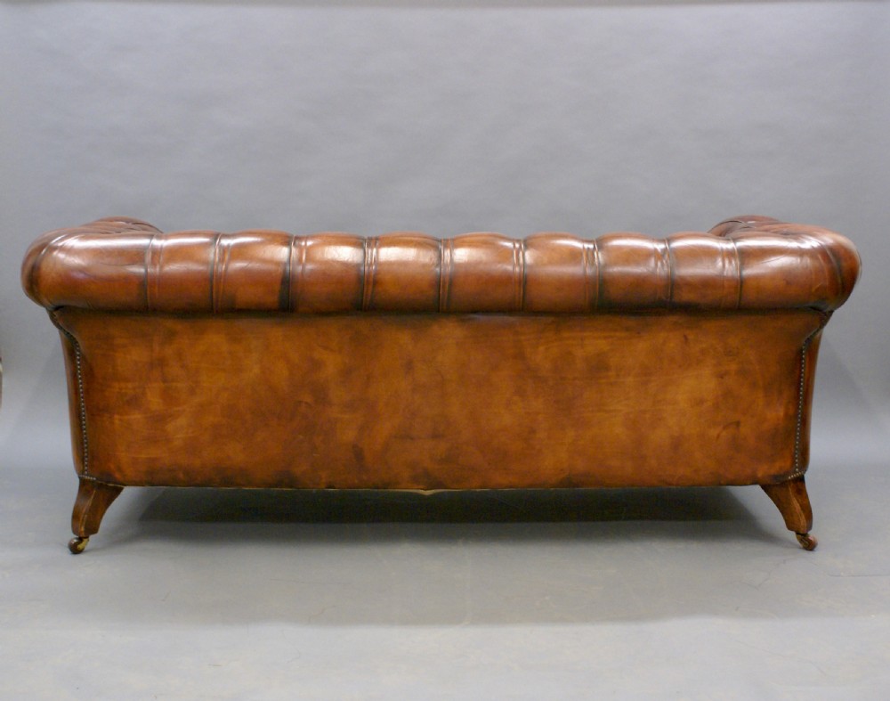 A Victorian leather chesterfield View V