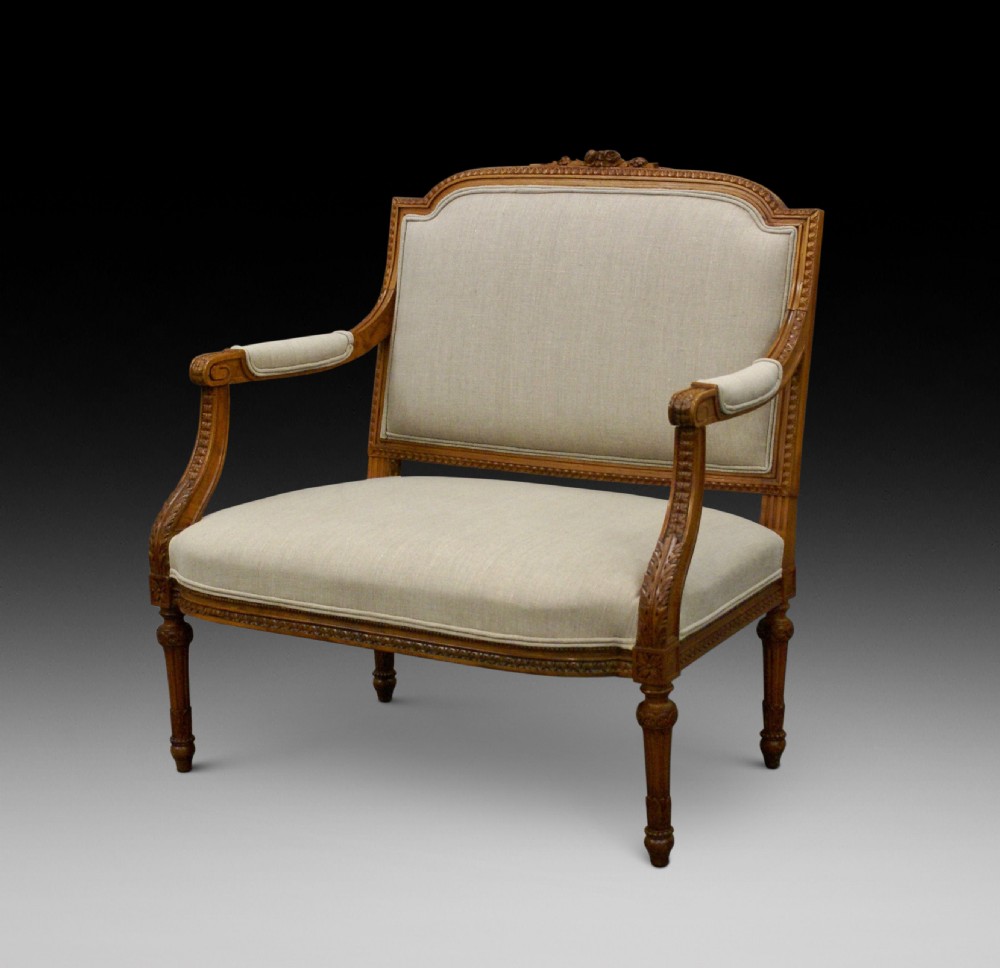 A large walnut French arm chair
