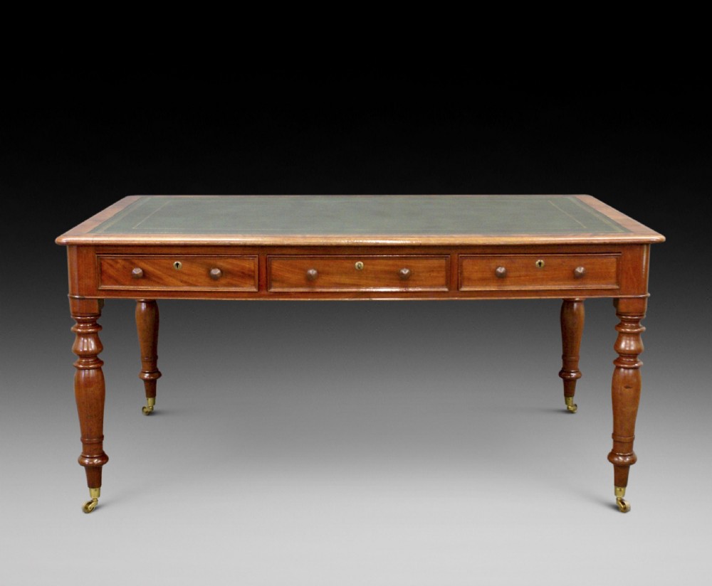 A mid-19th C mahogany, partners writing table