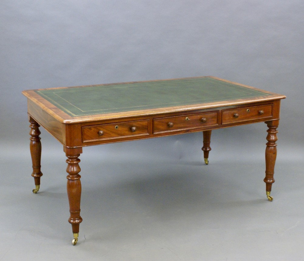 A mid-19th C mahogany, partners writing table View II